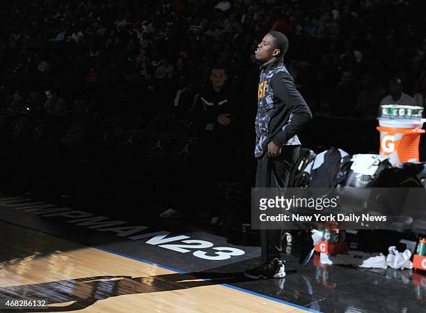 Injured Isaiah Whitehead of Lincoln HS during the pre game announcements before game action of the 2014 Jordan Brand Classic All American game at the...