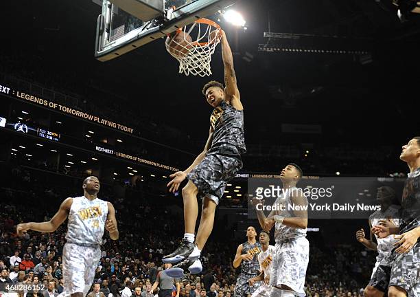 East player Kelly Oubre dunks during game action of the 2014 Jordan Brand Classic All American game at the Barclays Center.