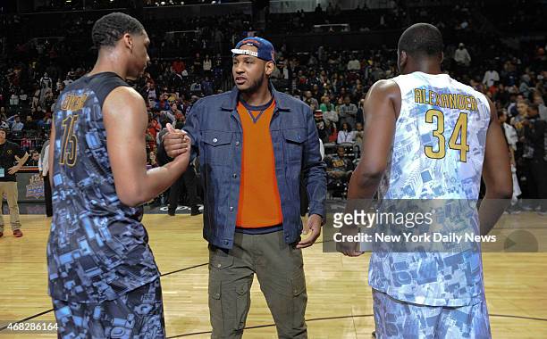 East MVP Jahill Okafor, New York Knicks Carmelo Anthony and West MVP Cliff Alexander with trophy's after game action of the 2014 Jordan Brand Classic...