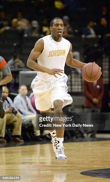 Khadeen Carrington of Bishop Loughlin HS brings the ball up during game action of the 2014 Jordan Brand Classic Regional Team game at the Barclays...