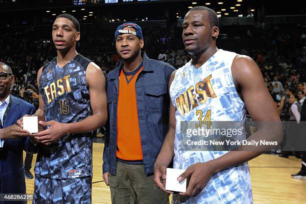 East MVP Jahill Okafor, N ew York Knicks Carmelo Anthony and West MVP Cliff Alexander with trophy's after game action of the 2014 Jordan Brand...