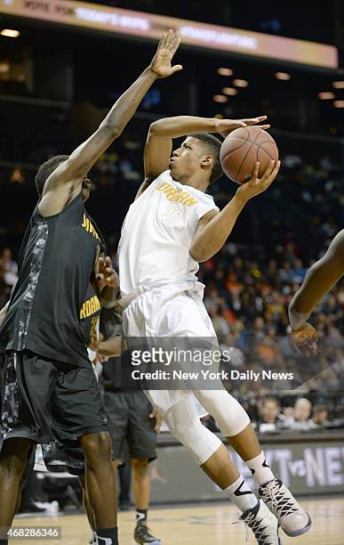 Desi Rodriguez of Lincoln HS drives to the basket during game action of the 2014 Jordan Brand Classic Regional Team game at the Barclays Center.