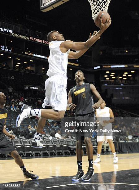 Samson Usilo from Nazareth HS scores during game action of the 2014 Jordan Brand Classic Regional Team game at the Barclays Center.