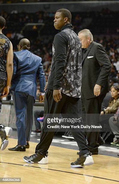Injured Isaiah Whitehead of Lincoln HS Injured Isaiah Whitehead of Lincoln HS during game action of the 2014 Jordan Brand Classic All American game...