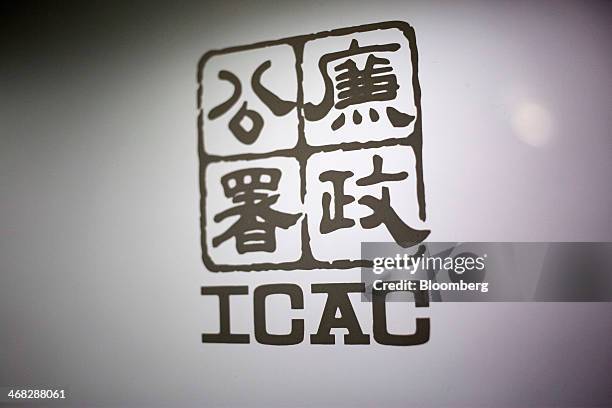 The Hong Kong Independent Commission Against Corruption logo is displayed on a glass door inside the commission's headquarters in Hong Kong, China,...