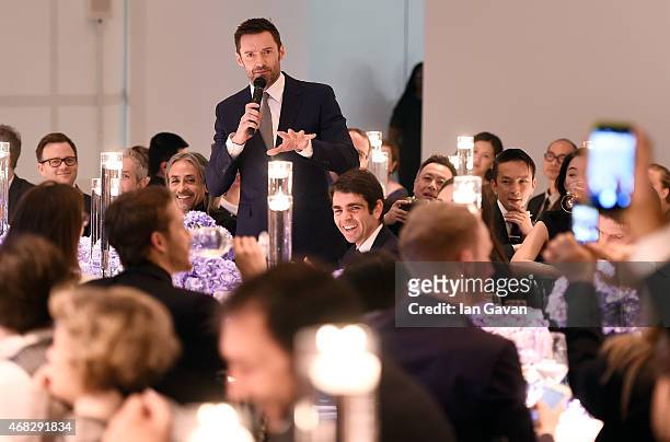 Montblanc CEO Jerome Lambert laughs as actor Hugh Jackman speaks during the Montblanc Meisterstuck Sfumato Launch on April 1, 2015 in London, England.