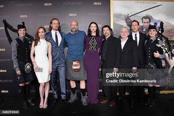 Lotte Verbeek, Sam Heughan, Graham McTavish, Caitriona Balfe, Ronald D. Moore, Gary Lewis, and Tobias Menzies attend the "Outlander" mid-season New...