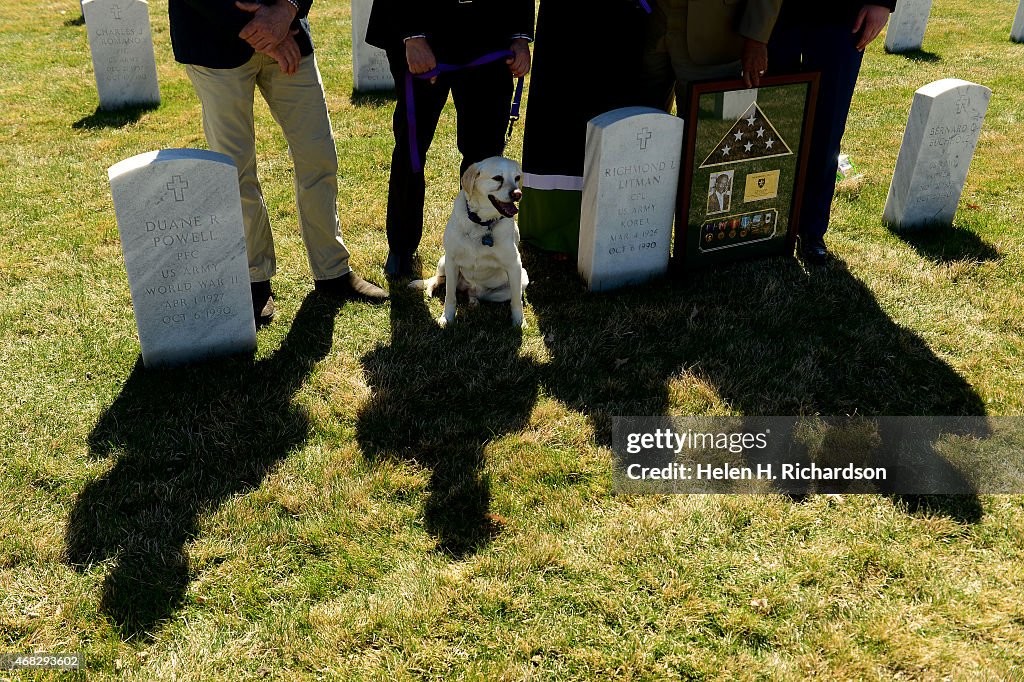 Lost Purple Heart medal, found by a dog, is returned to the family at Fort Logan Cemetery in Denver, Colorado.