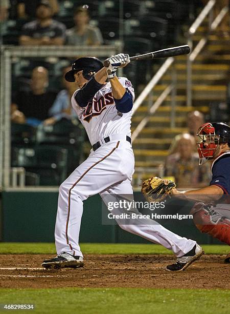 Doug Bernier of the Minnesota Twins bats during a Grapefruit League spring training game against the Boston Red Sox on March 5, 2015 at the...