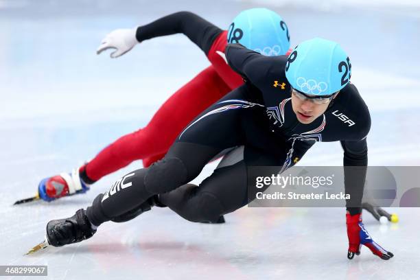 Celski of the United States and Dequan Chen of China compete in the Short Track Men's 1500m Semifinal on day 3 of the Sochi 2014 Winter Olympics at...