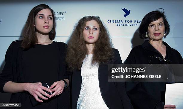 Nadezhda Tolokonnikova and Maria Alyokhina of Russian punk protest group Pussy Riot and Human Rights activist Bianca Jagger attend a press conference...