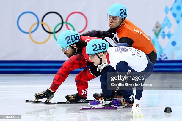 Charles Hamelin of Canada, Jack Whelbourne of Great Britain and Sjinkie Knegt of Netherlands compete in the Short Track Men's 1500m Semifinal on day...