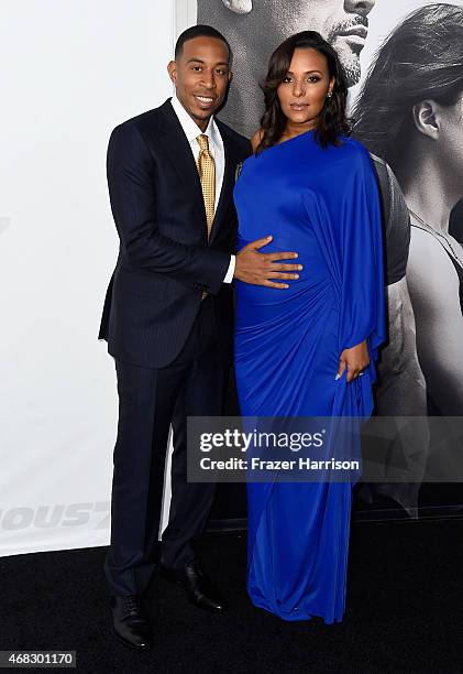 Actor/recording artist Ludacris and Eudoxie Mbouguiengue attend Universal Pictures' "Furious 7" premiere at TCL Chinese Theatre on April 1, 2015 in...