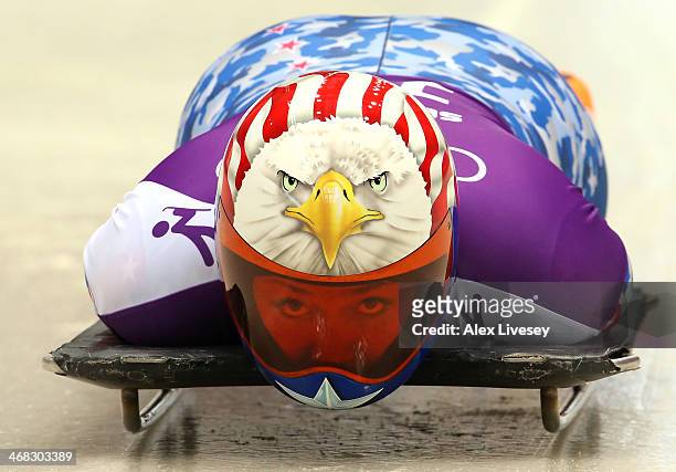 Katie Uhlaender of USA prepares in action during a Women's Skeleton training session on Day 3 of the Sochi 2014 Winter Olympics at the Sanki Sliding...