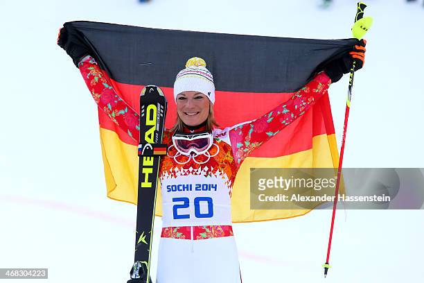 Gold medalist Maria Hoefl-Riesch of Germany celebrates during the flower ceremony for the Alpine Skiing Women's Super Combined on day 3 of the Sochi...