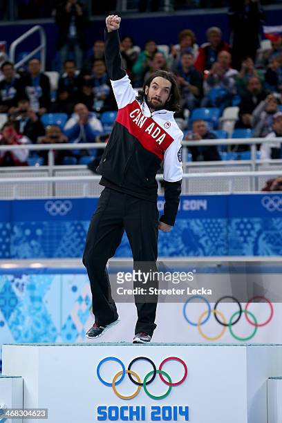 Gold medalist Charles Hamelin of Canada celebrates during the flower ceremony for the Short Track Men's 1500m Final on day 3 of the Sochi 2014 Winter...