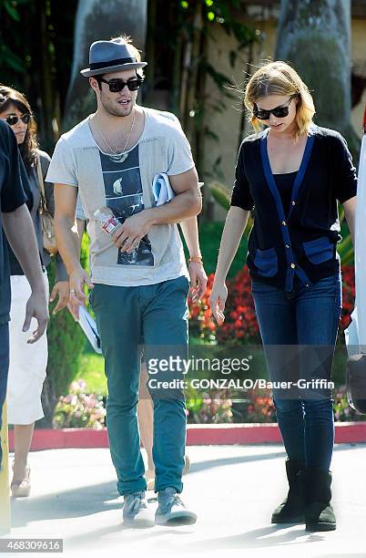 Josh Bowman and Emily VanCamp are seen on the movie set of 'Revenge' on October 01, 2012 in Los Angeles, California.
