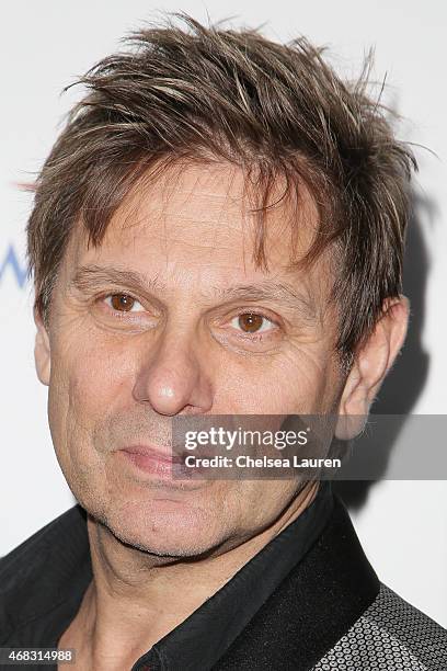 Guitarist Roger Andrew Taylor of Duran Duran arrives at the 10th anniversary of the David Lynch Foundation at The Ace Hotel Theater on April 1, 2015...