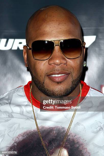 Rapper Flo Rida attends the Revolt Live hosts exclusive "Furious 7" takeover with musical performances from the official movie soundtrack held at...