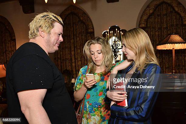 John William Codling, Poppy Jamie and Greta Bellamacina attend a private cocktail party to celebrate the launch of With Love: A Collection of...