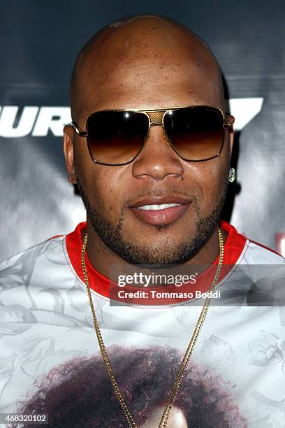 Rapper Flo Rida attends the Revolt Live hosts exclusive "Furious 7" takeover with musical performances from the official movie soundtrack held at...