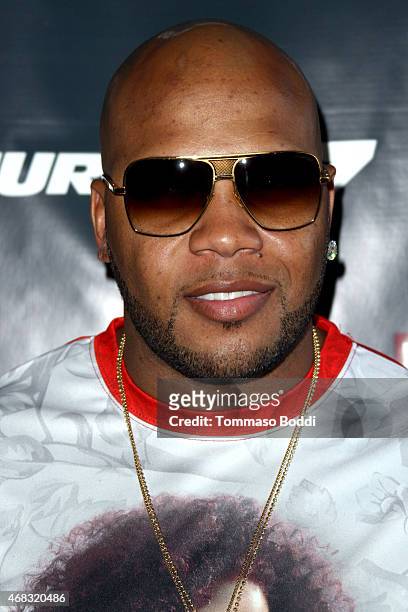 Rapper Flo Rida attends the Revolt Live hosts exclusive "Furious 7" takeover with musical performances from the official movie soundtrack held at...