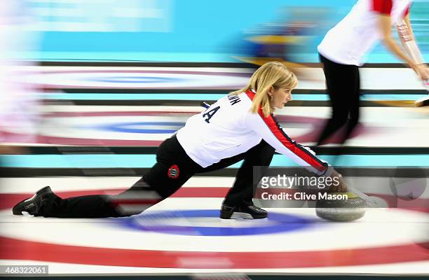 Erika Brown of USA in action during the round robin match against Switzerland during day 3 of the Sochi 2014 Winter Olympics at Ice Cube Curling...