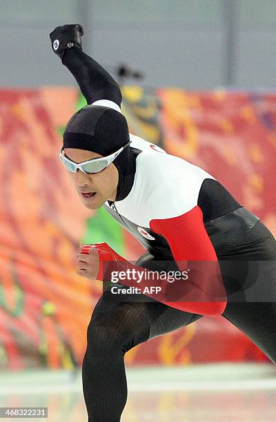 Canada's Gilmore Junio competes during the Men's Speed Skating 500 m at the Adler Arena during the Sochi Winter Olympics on February 10, 2014. AFP...