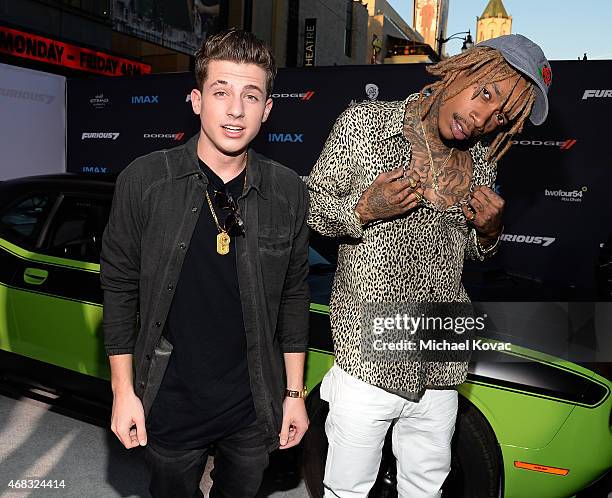 Recording artists Charlie Puth and Wiz Khalifa attend the Furious 7 Los Angeles Premiere Sponsored by Dodge at TCL Chinese 6 Theatres on April 1,...
