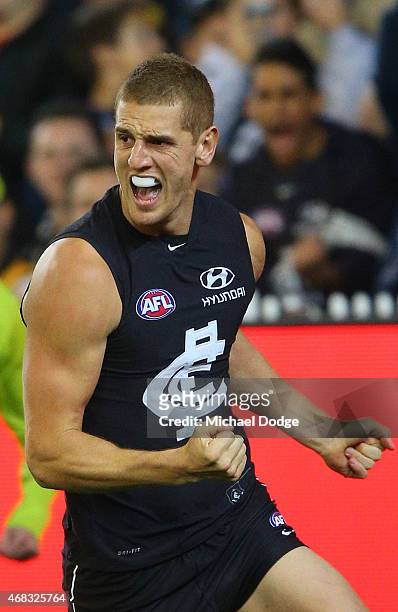Liam Jones of the Blues celebrates a goal during the round one AFL match between the Carlton Blues and the Richmond Tigers at Melbourne Cricket...