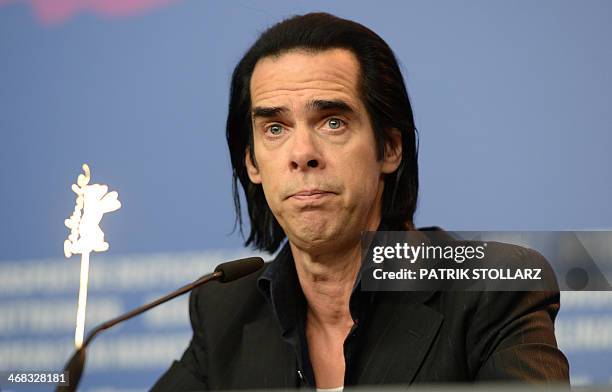 Australian songwriter and screenwriter Nick Cave poses at a photocall for the film "20,000 Days on Earth" presented in the Panorama section of the...
