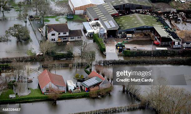 Flood water surrounds a farm on the road to the village of Muchelney on the Somerset Levels near Langport on February 10, 2014 in Somerset, England....