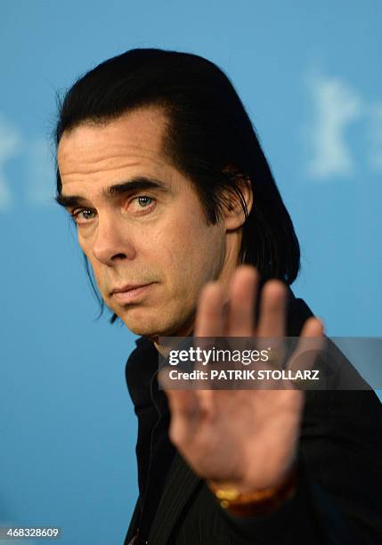 Australian screenwriter Nick Cave poses at a photocall for the film "20,000 Days on Earth" presented in the Berlinale Panorama Documentaries of the...