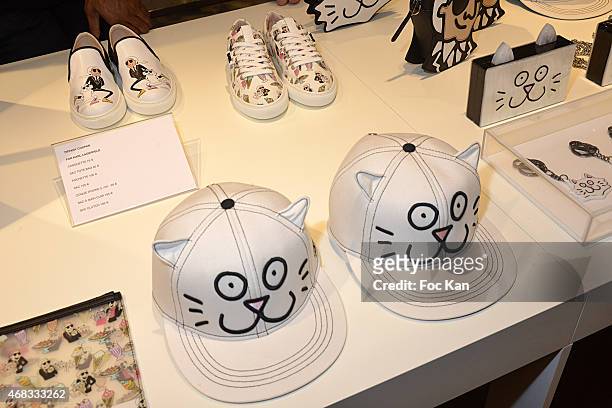 Accessories with effigies of Karl Lagerfeld and his cat Choupette are exhibited during The Tiffany Cooper For Karl Lagerfeld At Colette on April 1,...