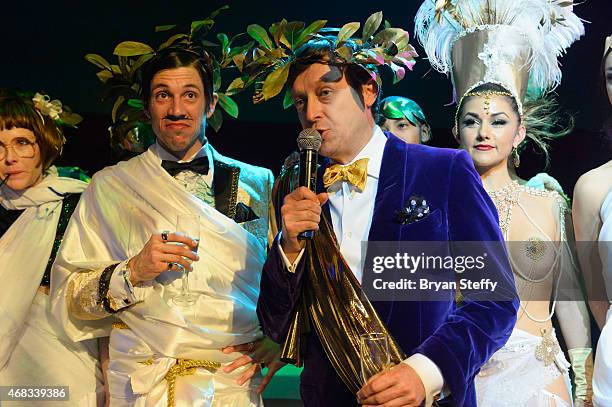 Cast member The Gazillionaire looks on as producer Ross Mollison speaks during the show's fourth anniversary party at Caesars Palace on April 1, 2015...