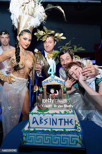 Cast member Melody Sweets, producer Ross Mollison and cast members The Gazillionaire and Joy Jenkins attend the show's fourth anniversary party at...
