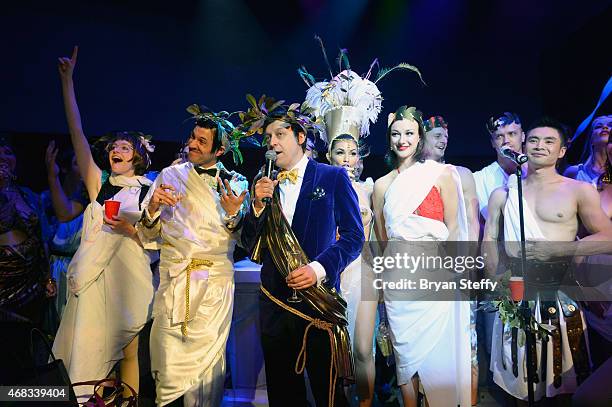 Cast members Joy Jenkins and The Gazillionaire look on as producer Ross Mollison speaks to attendees during the show's fourth anniversary party at...