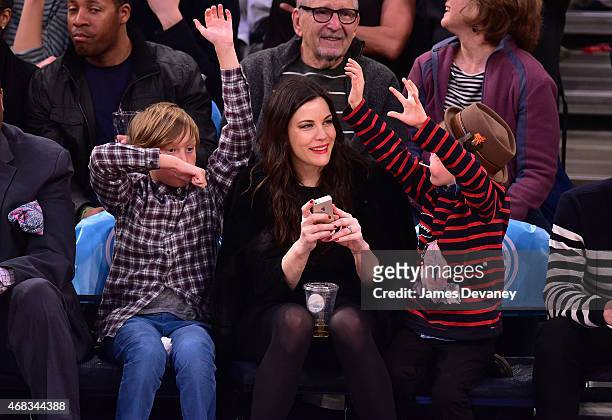 Milo Langdon, Liv Tyler and Grey Gardner attend Brooklyn Nets vs New York Knicks game at Madison Square Garden on April 1, 2015 in New York City.