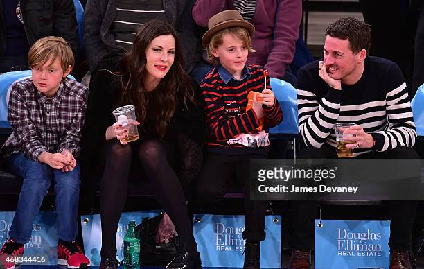 Milo Langdon, Liv Tyler, Grey Gardner and Dave Gardner attend Brooklyn Nets vs New York Knicks game at Madison Square Garden on April 1, 2015 in New...