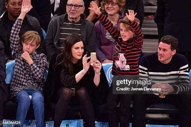 Milo Langdon, Liv Tyler, Grey Gardner and Dave Gardner attend Brooklyn Nets vs New York Knicks game at Madison Square Garden on April 1, 2015 in New...