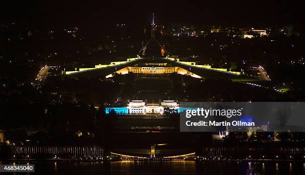 Old Parliament House is illuminated in blue to mark the World Autism Awareness Day on April 2, 2015 in Canberra, Australia.