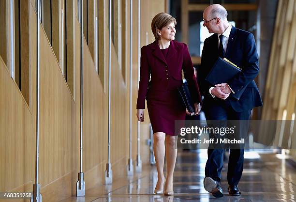 First Minister Nicola Sturgeon and Deputy Frist Minister John Swinney attend First Ministers Questions at the Scottish Parliament on April 2, 2015 in...