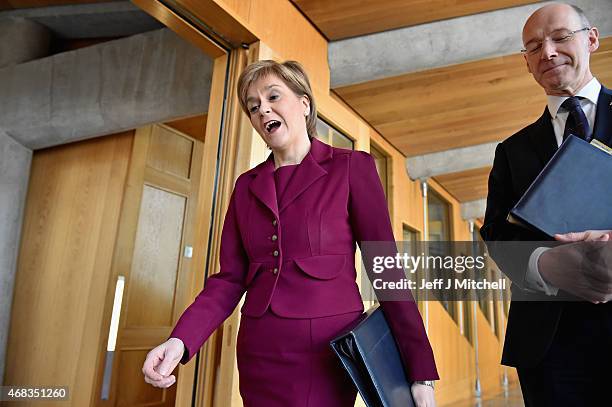 First Minister Nicola Sturgeon and Deputy Frist Minister John Swinney attend First Ministers Questions at the Scottish Parliament on April 2, 2015 in...