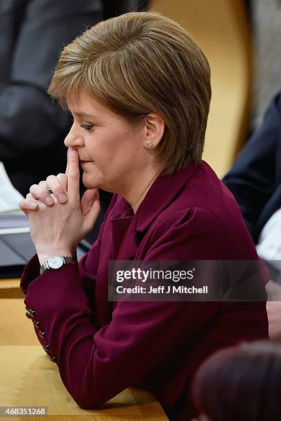 First Minister Nicola Sturgeon attends First Ministers Questions at the Scottish Parliament on April 2, 2015 in Edinburgh, Scotland. Tonight will see...