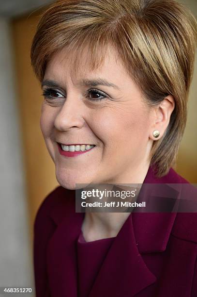 First Minister Nicola Sturgeon attends First Ministers Questions at the Scottish Parliament on April 2, 2015 in Edinburgh, Scotland. Tonight will see...