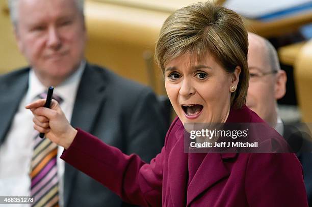 First Minister Nicola Sturgeon attends First Ministers Questions at the Scottish Parliament on April 2, 2015 in Edinburgh, Scotland. Tonight will see...