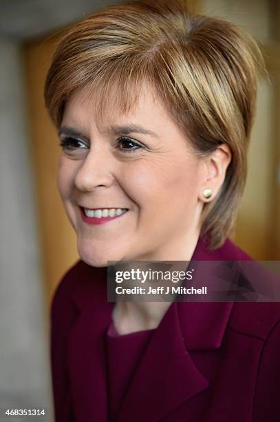 First Minister Nicola Sturgeon attends First Ministers Questions at the Scottish Parliament on April 2, 2015 in Edinburgh, Scotland. Tonight will see...