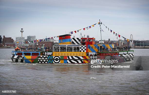 The newly painted Snowdrop travels on the River Mersey to Liverpool on April 2, 2015 seen from Birkenhead, England. The Mersey ferry has been...