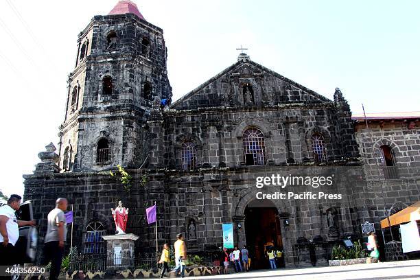 The workers while restoring the top front of San Ildefonso De Toledo Parish Church in Tanay, Rizal. The church of San Ildefonso De Toledo Parish...