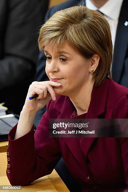 First Minister Nicola Sturgeon attends First Minister's Questions at the Scottish Parliament on April 2, 2015 in Edinburgh, Scotland. Tonight will...